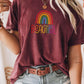 Maroon t-shirt with rainbow “Beautiful” design styled with a leather belt and ripped jeans. Boho rainbow shirt, self-love gift for women, retro inspirational tee, positive quote clothing.
